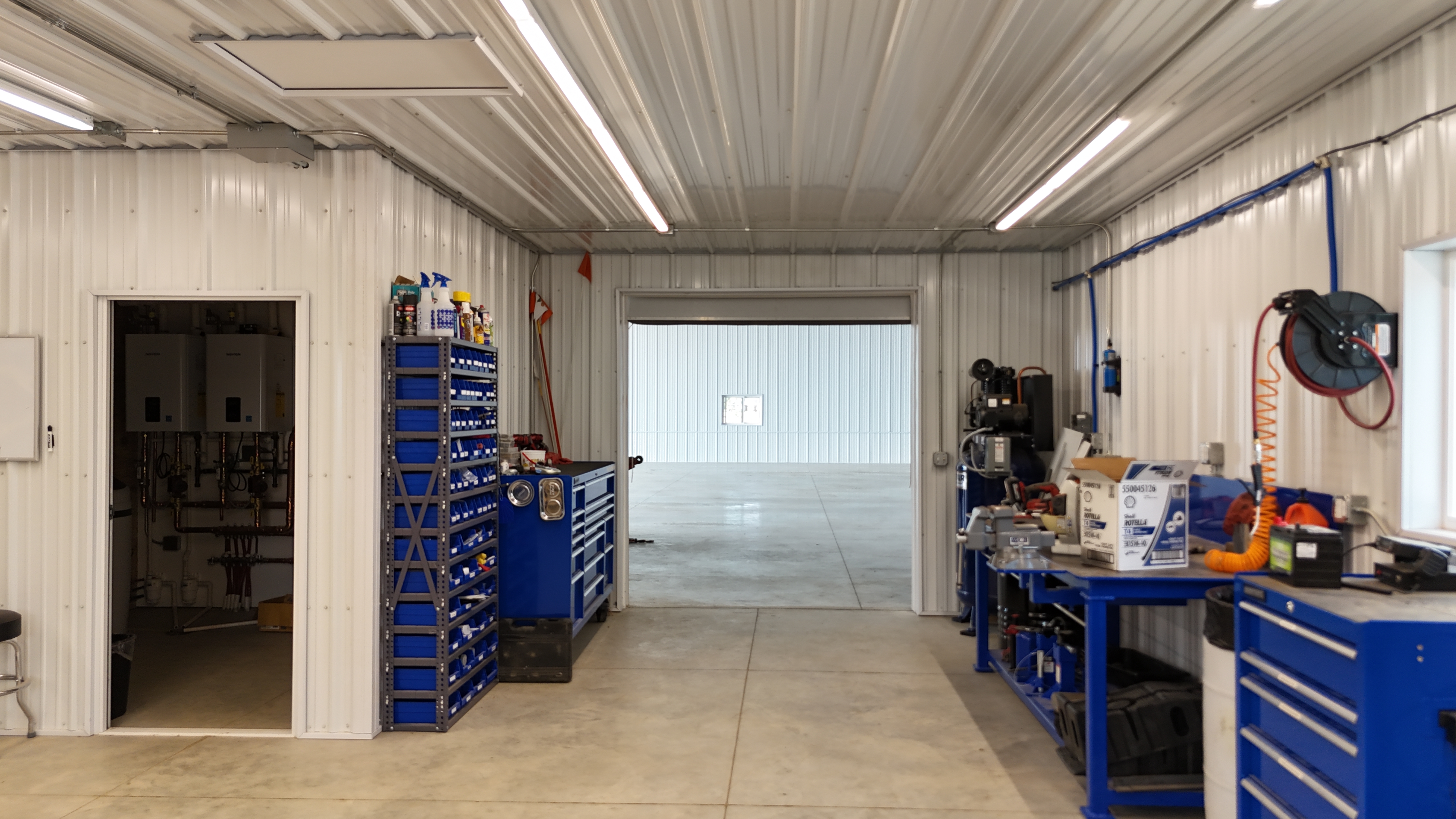 Doorways between shop space and storage area for large machinery